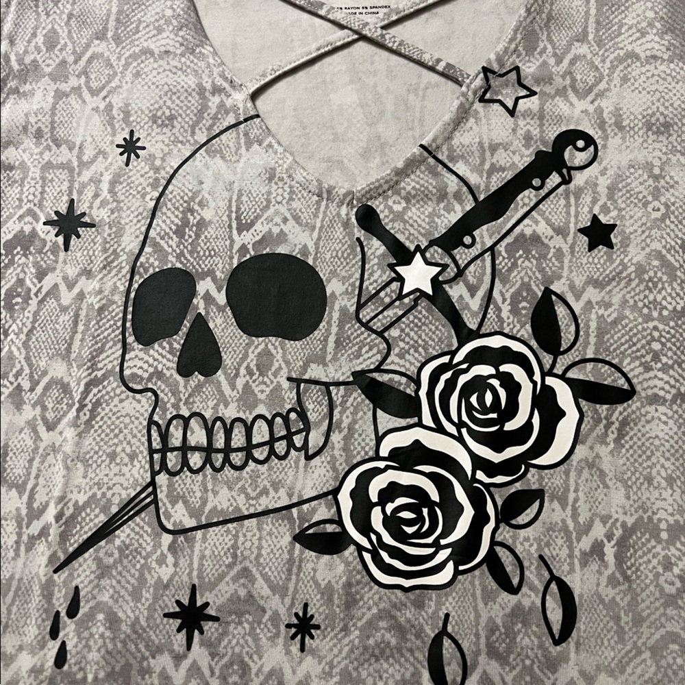 Torrid size 1 .   Scull/Bad ass babe shirt